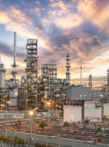 Oil and Gas Industrial zone,The equipment of oil refining,Close-up of industrial pipelines of an oil-refinery plant,Detail of oil pipeline with valves in large oil refinery.